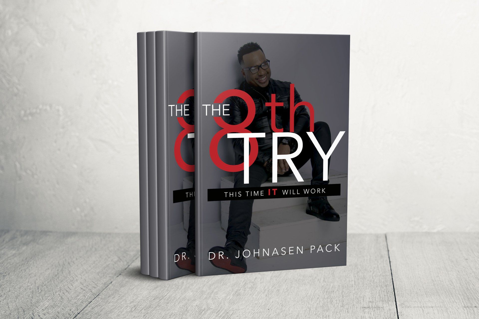 A stack of books titled the 8th try