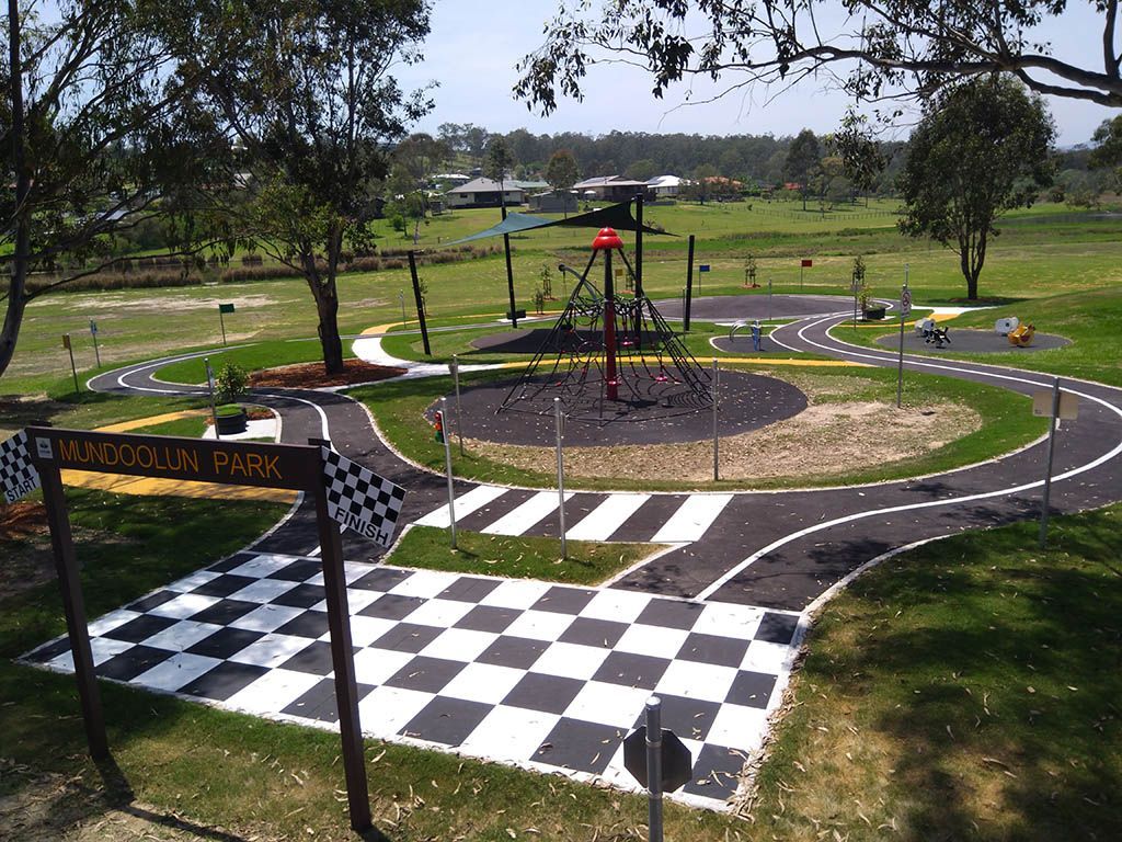 A playground with a checkered floor and a sign that says ' service park '