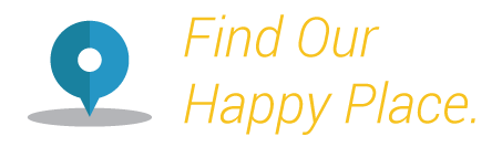 A blue pin with the words `` find our happy place '' written on it.