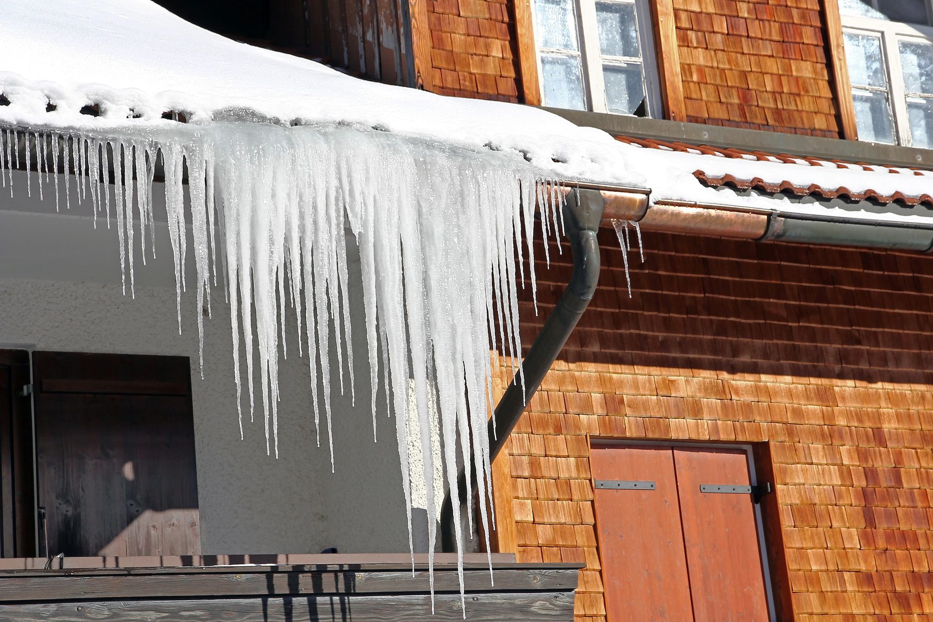 Icicles are hanging from the roof of a building in Central Virginia.