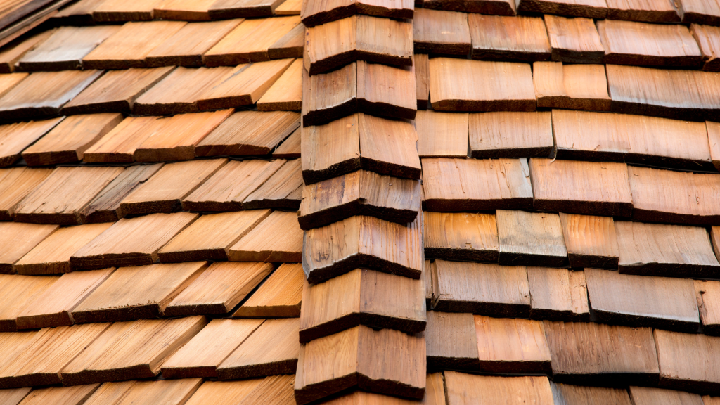 A close up of a wooden roof with a chevron pattern