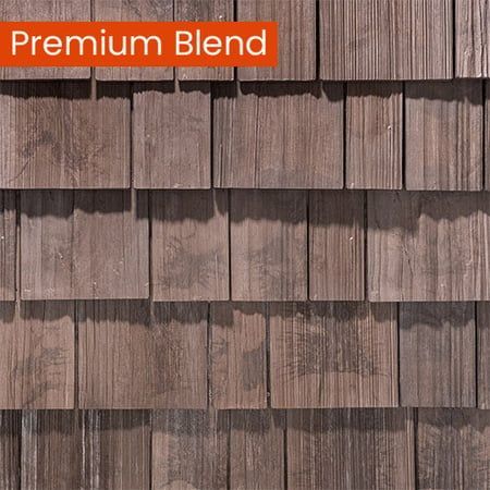 A close up of a wooden siding with the words premium blend on it