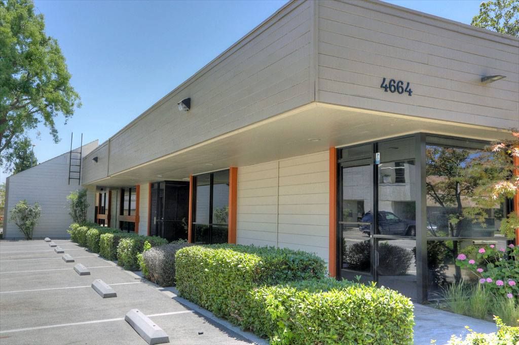 A building with the number 4864 on the side of it