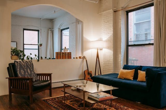 apartment interior with exposed brick walls