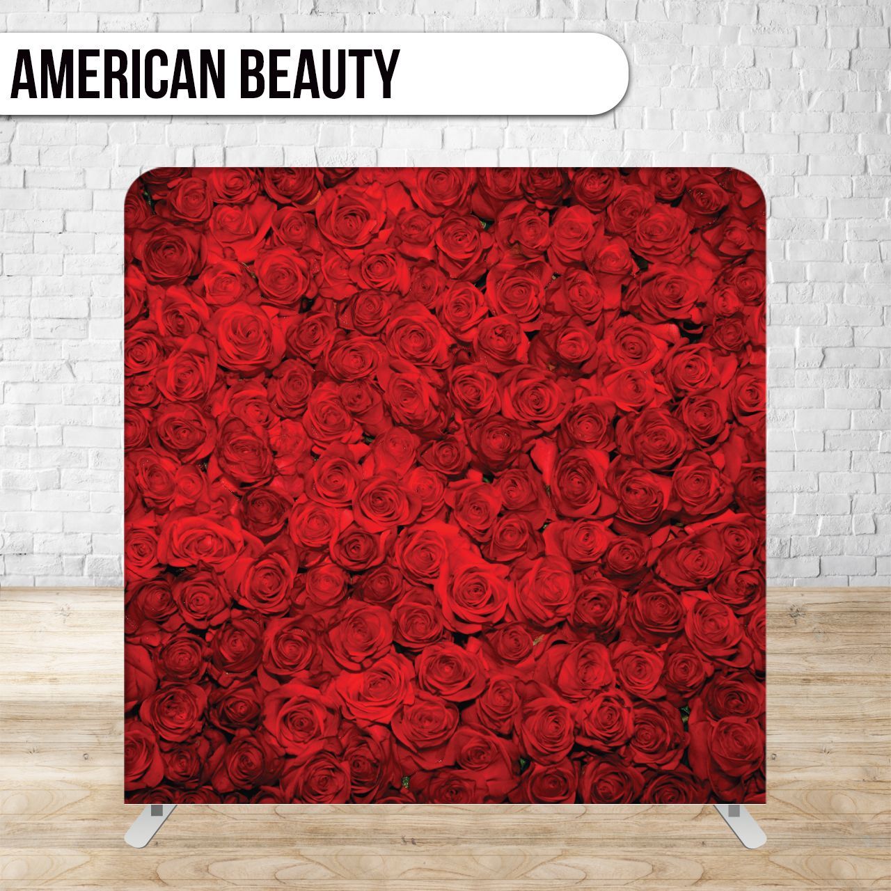 A wall of red roses with the words american beauty on it