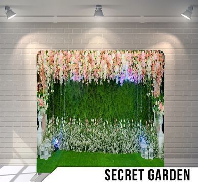 A picture of a secret garden with flowers hanging from the ceiling