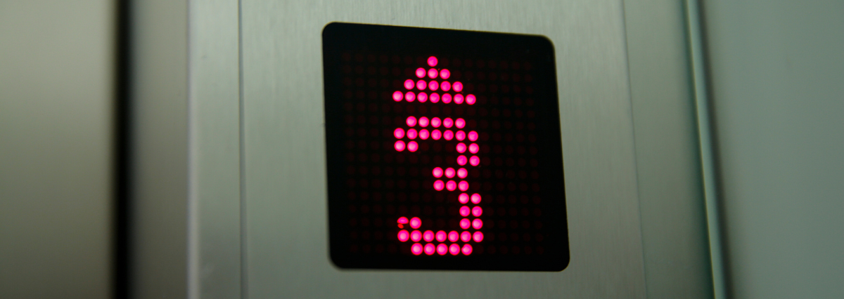 Elevator sign indicating going up to level 3