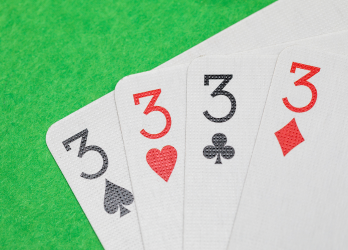 playing cards displaying the number 3 in all 4 suits