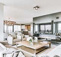 A living room filled with furniture and a coffee table.