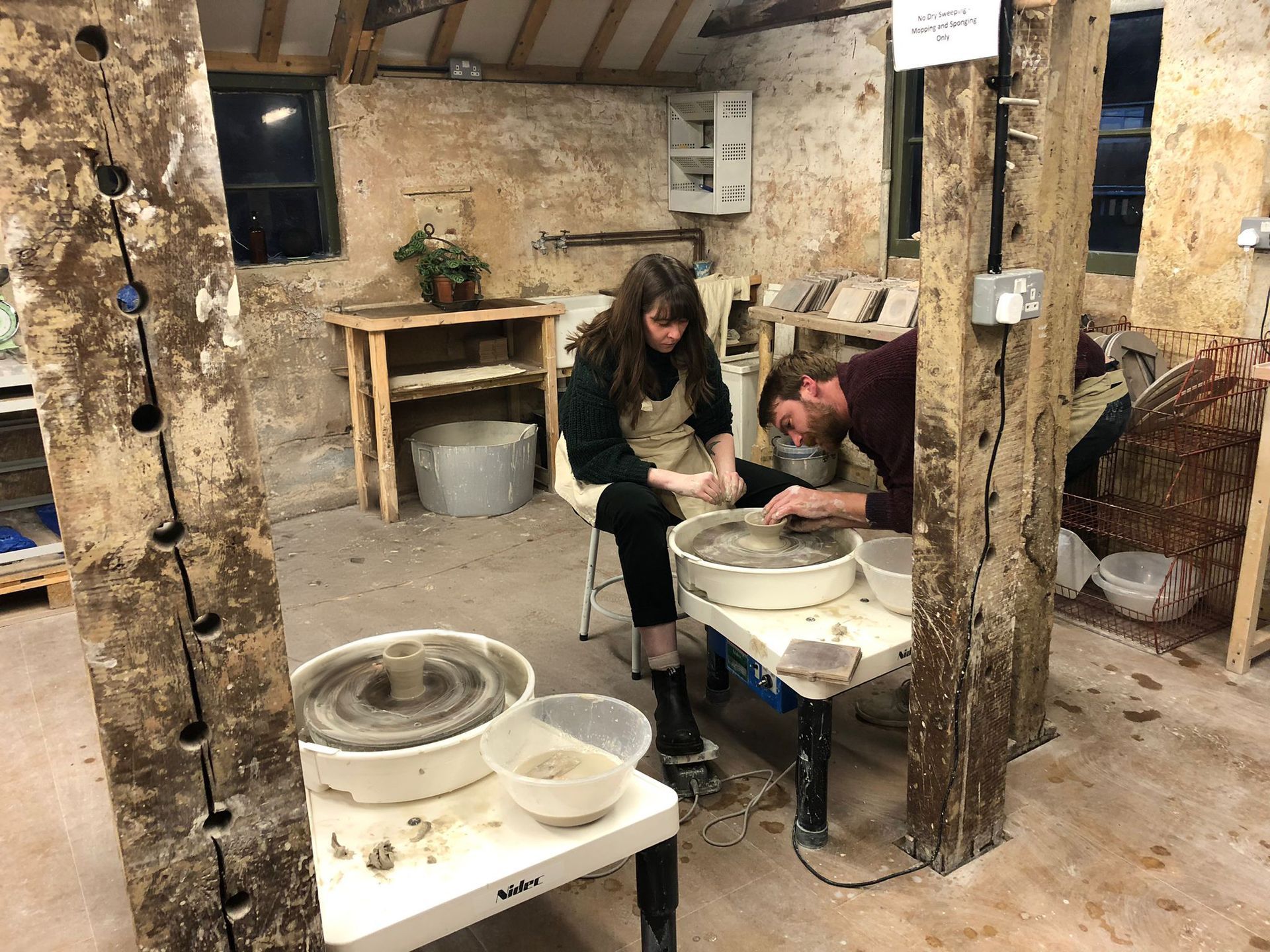 Team enjoying some pottery