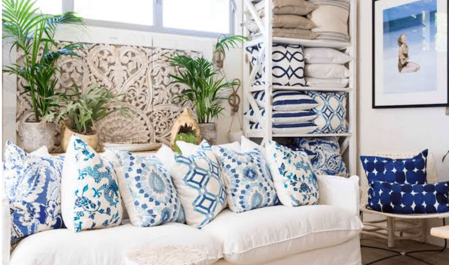 Pillows on white couch in display home