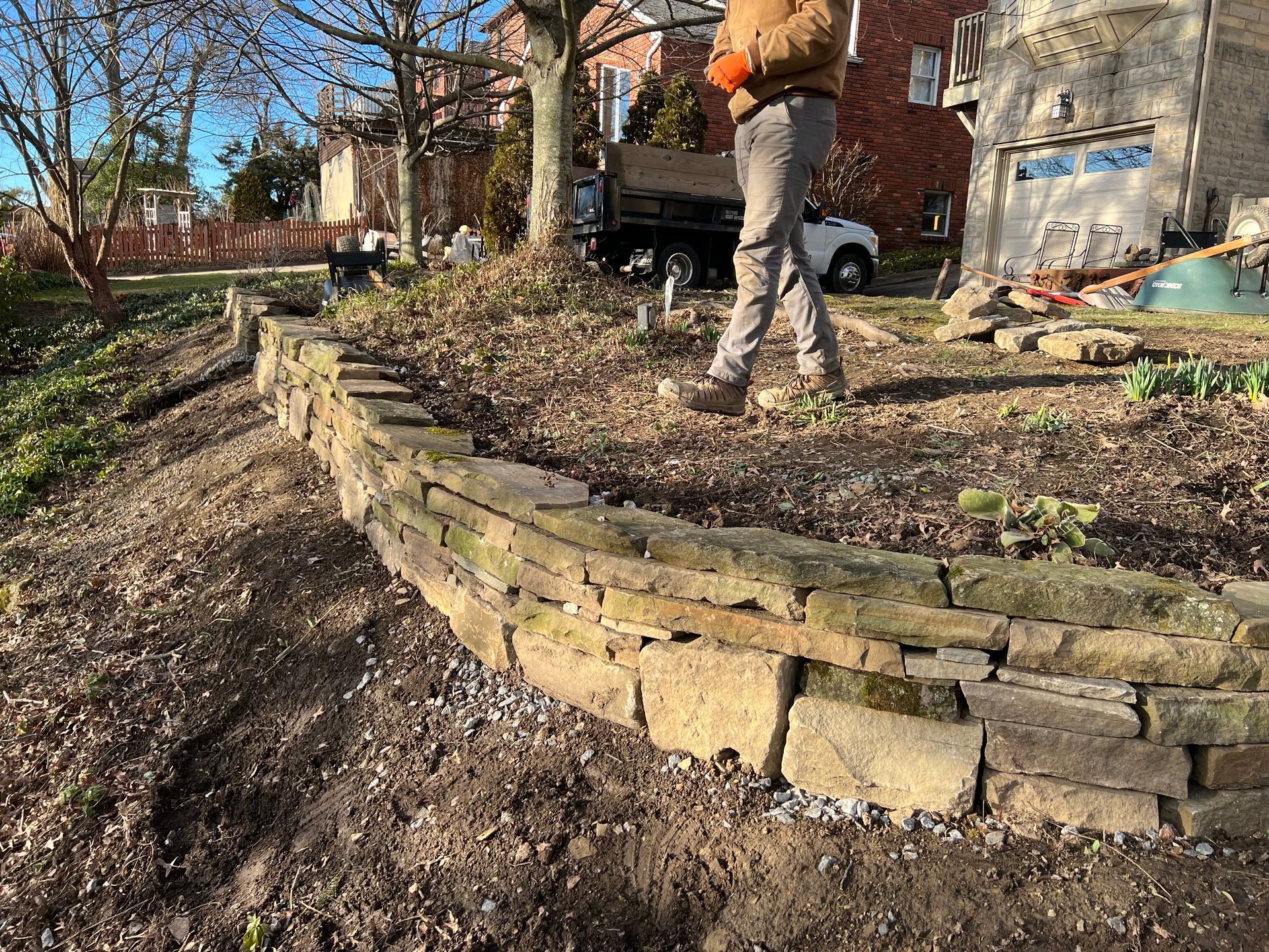 stone retaining wall hardscape installed in the front yard of  Pittsburgh Home