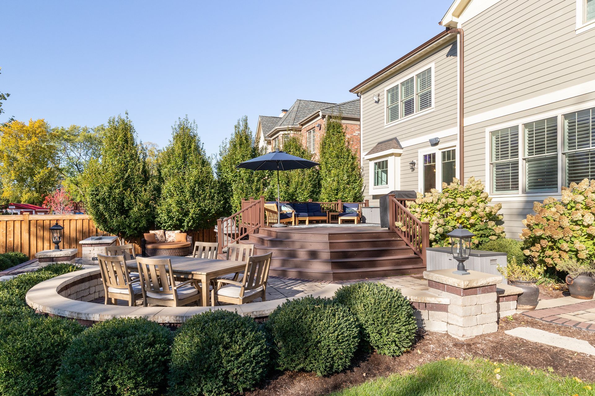 deck with added patio and landscaping.