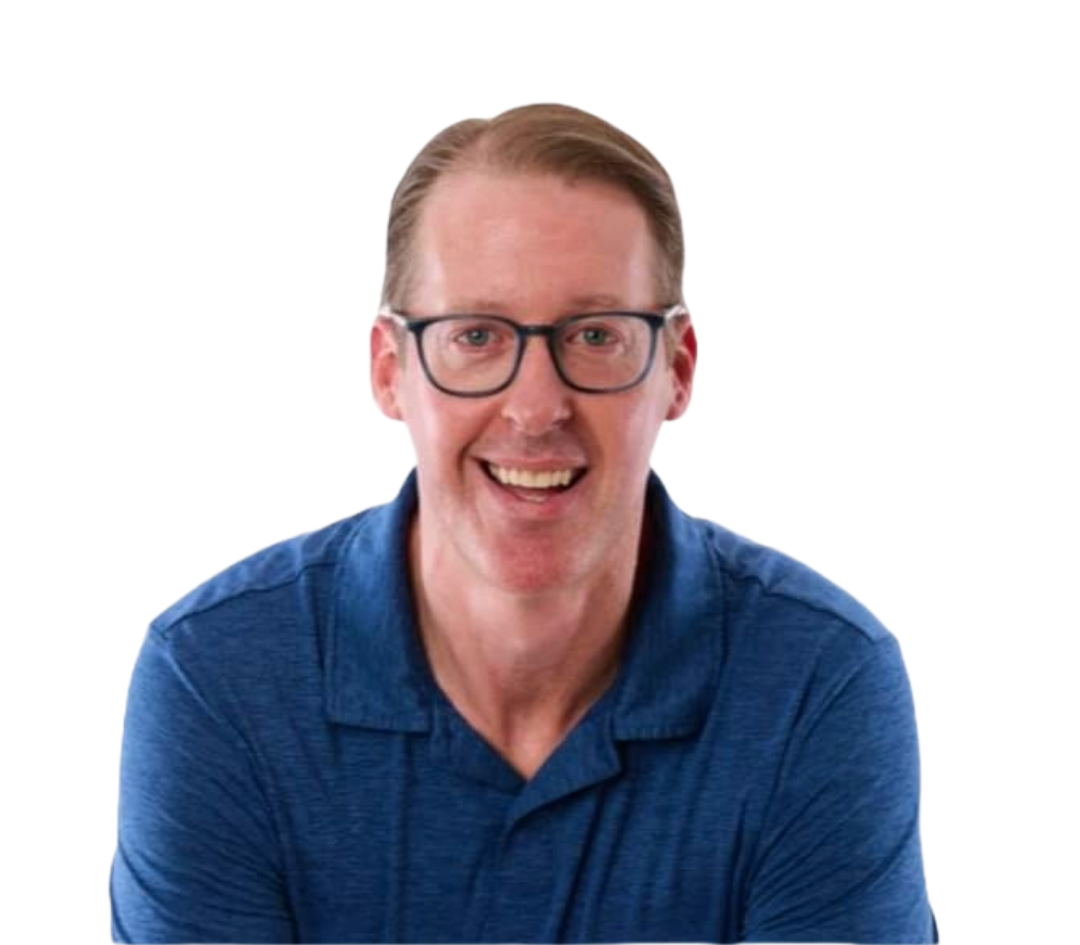 a man wearing glasses and a blue shirt smiles for the camera
