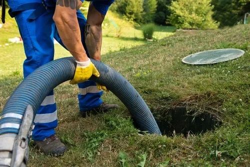 purging a sewer in a meadow