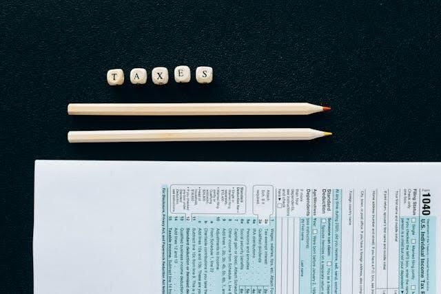 a tax form with two pencils next to it