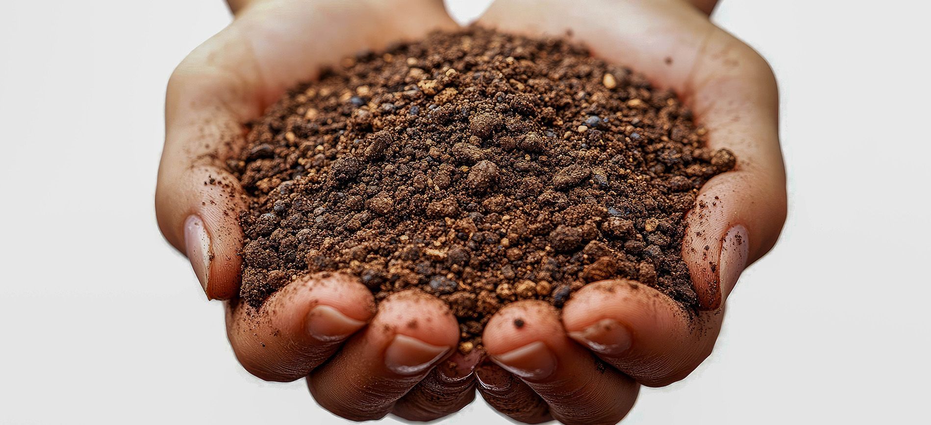 Technician blending crop-specific fertilizer for precision use in an innovative farming facility.