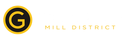 The Grand Mill District logo.