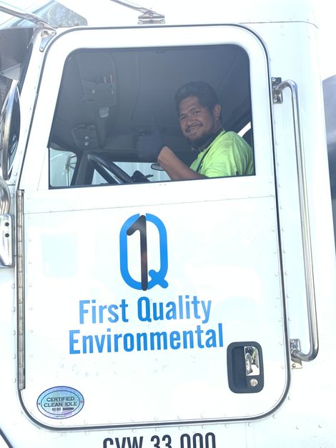 Smiling worker driving a truck