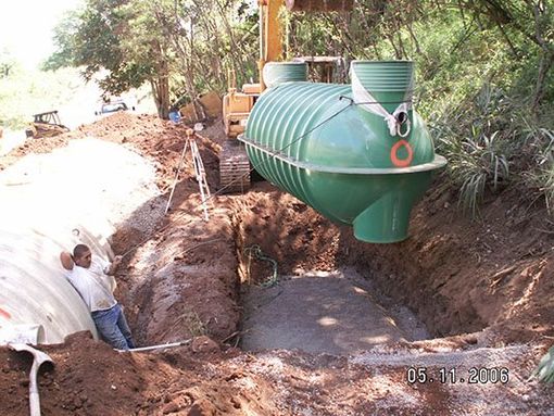 Placing a second wastewater tank onto ground