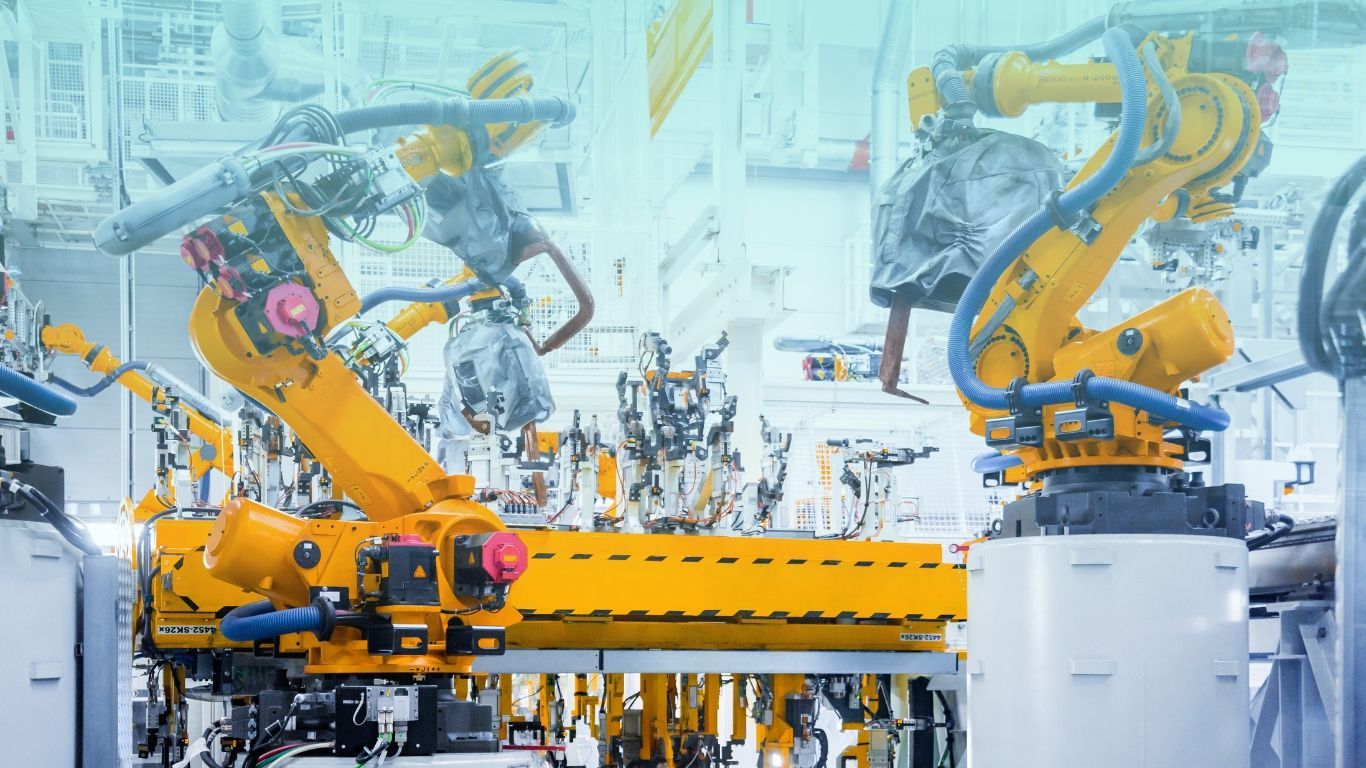 Manufacturing equipment on a job site, representing equipment depreciation tax strategies.