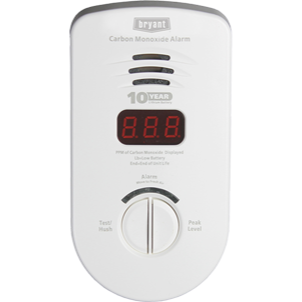 White Bryant carbon monoxide alarm with a digital display, a test/reset button, and a 10-year warranty label.