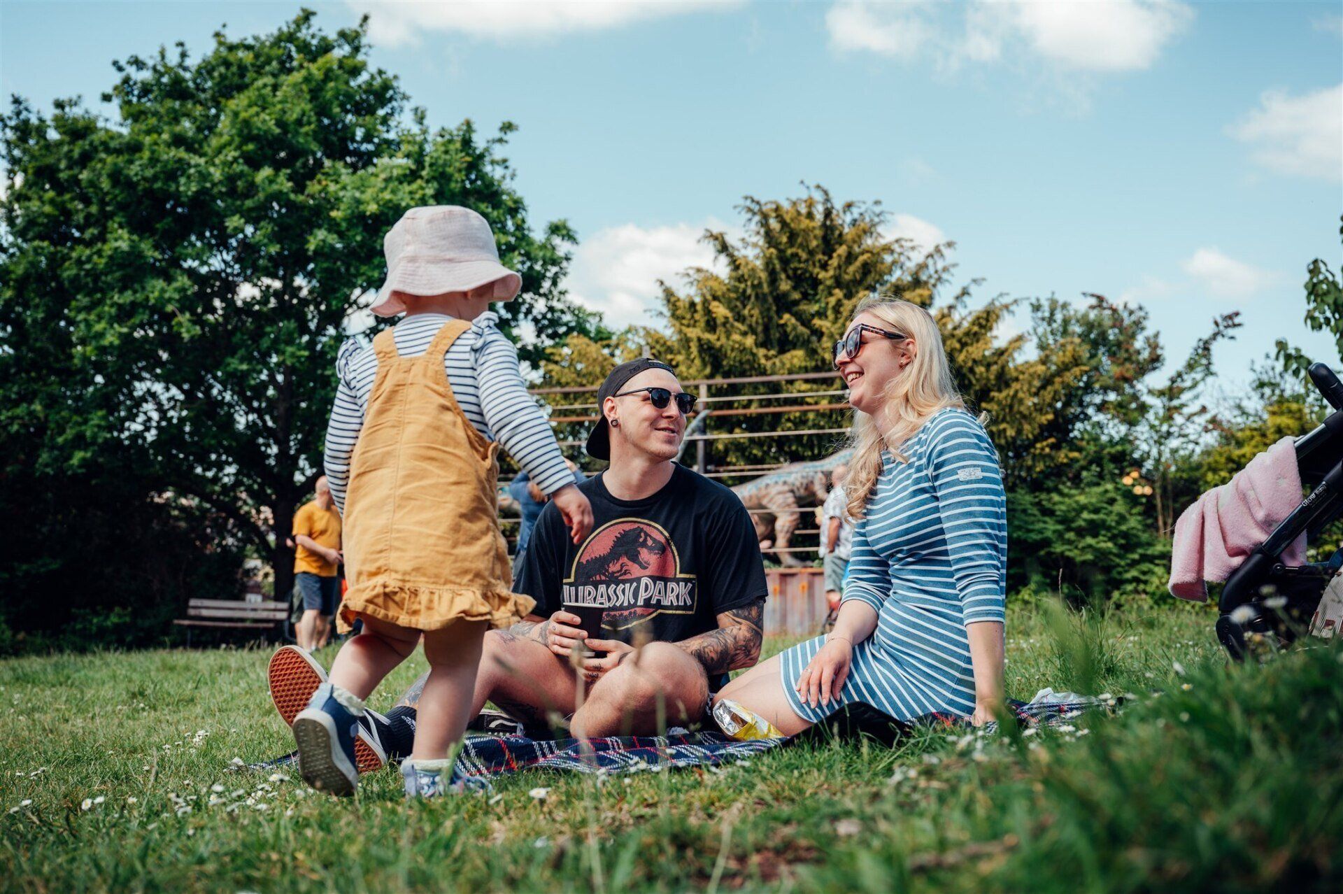 A family is having a picnic in the park.