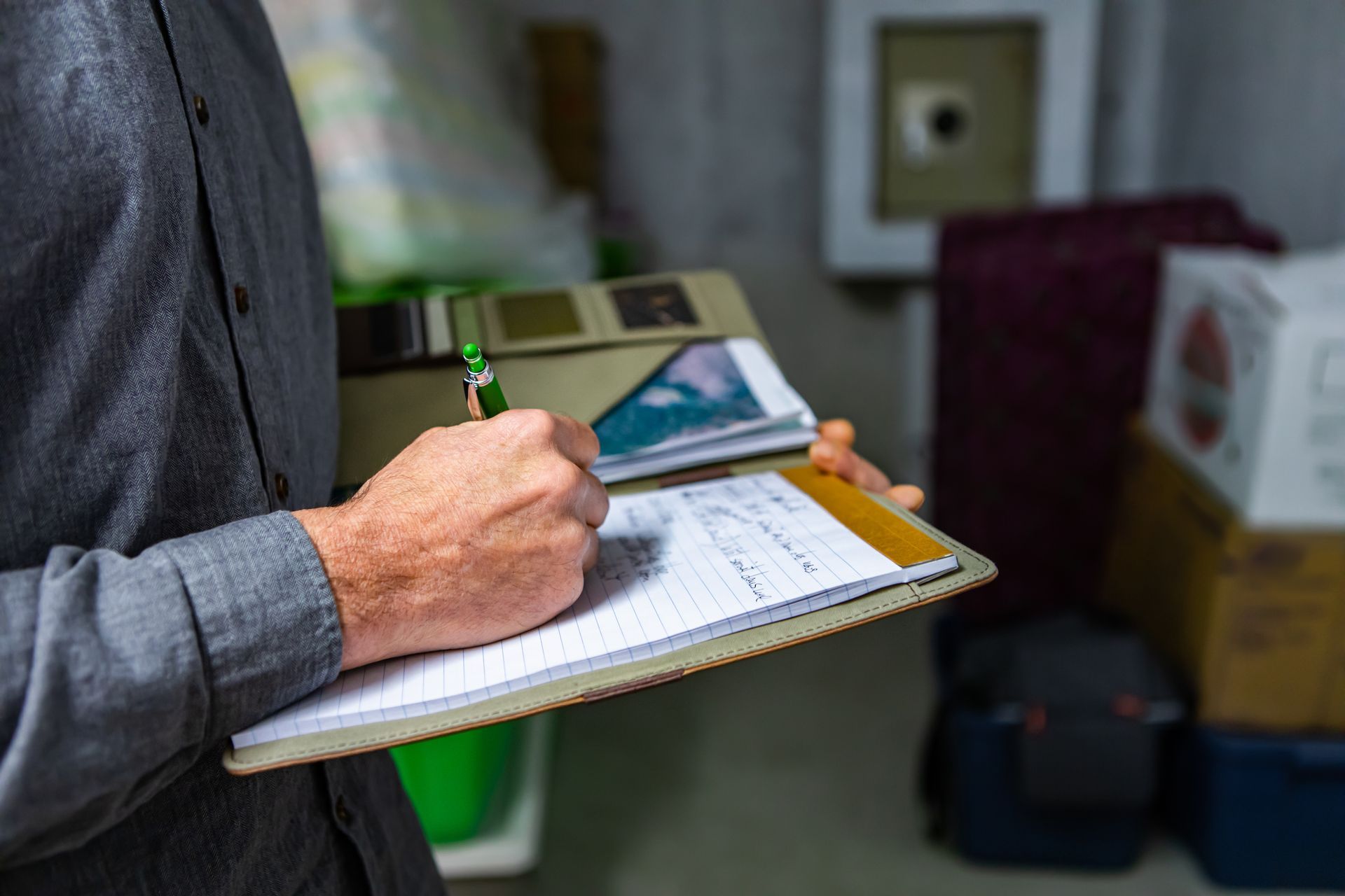 inspector holding a notebook in his hand during a home inspection