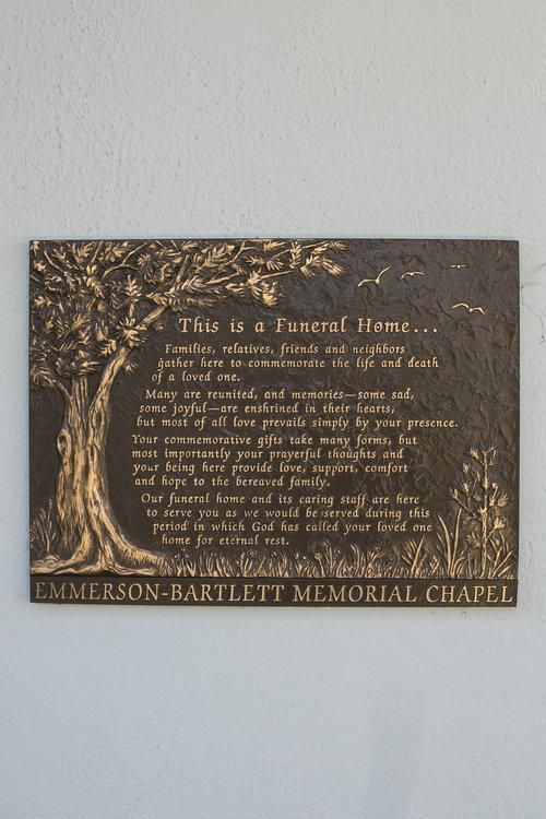 Plaque on wall of exterior view of Emmerson-Bartlett Memorial Chapel Redlands, CA