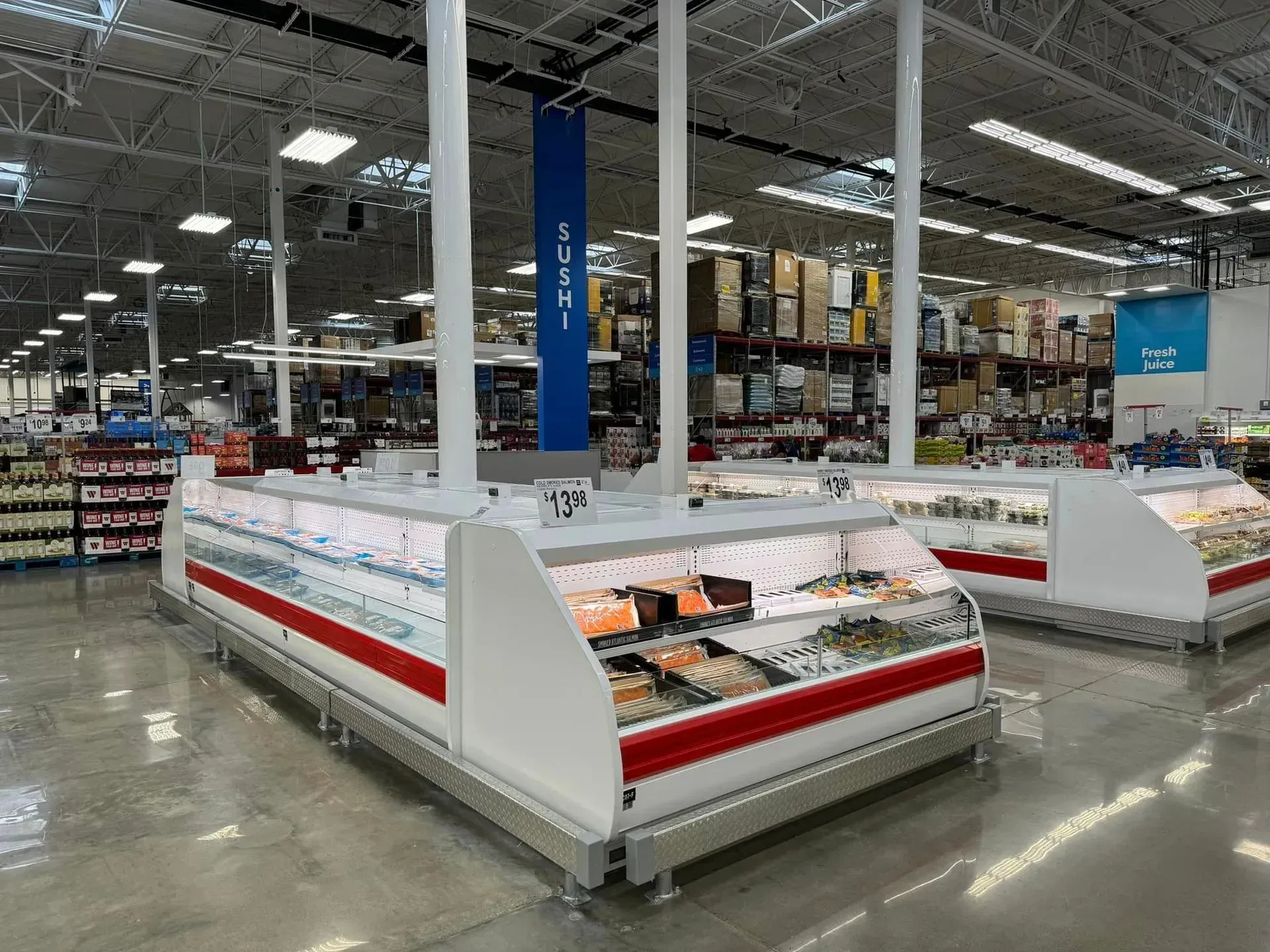 A grocery store filled with lots of frozen foods.