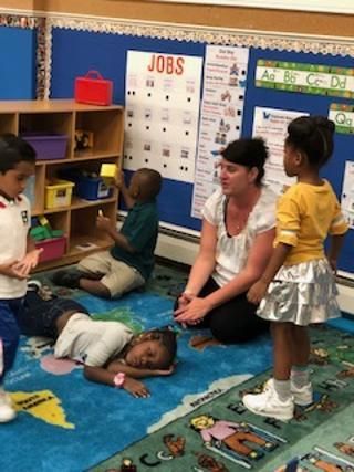 Teacher and Kids — Trenton, NJ — Forrest Valley Day Care Inc.