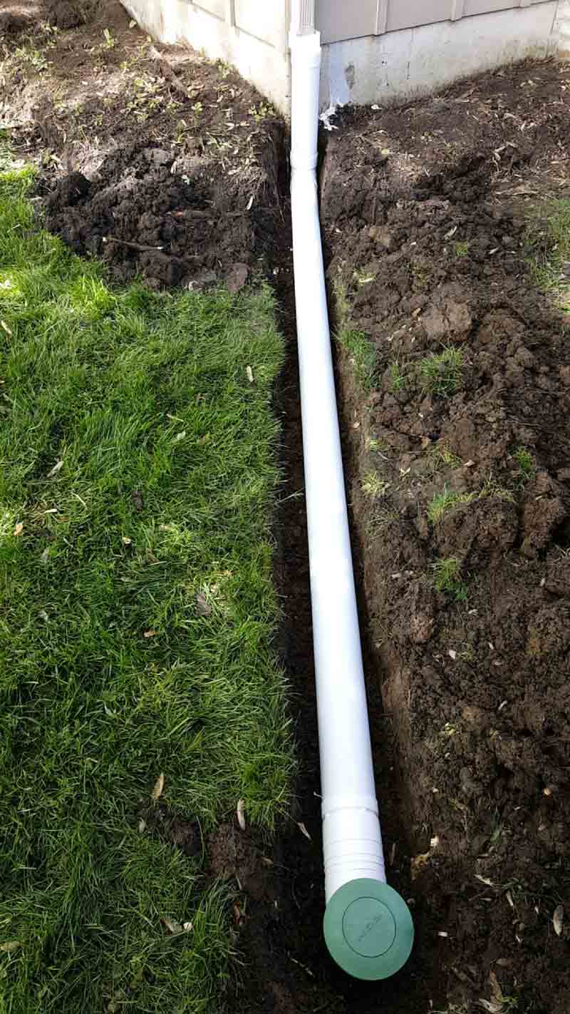 pipe in grass and dirt