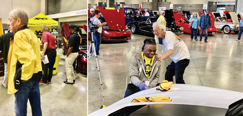 Indoor car show with people gathered around a yellow race car and a red sports car