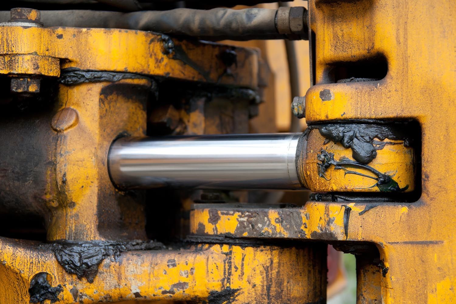 The hydraulic piston of yellow excavator | Sale, VIC | Union Hydraulics