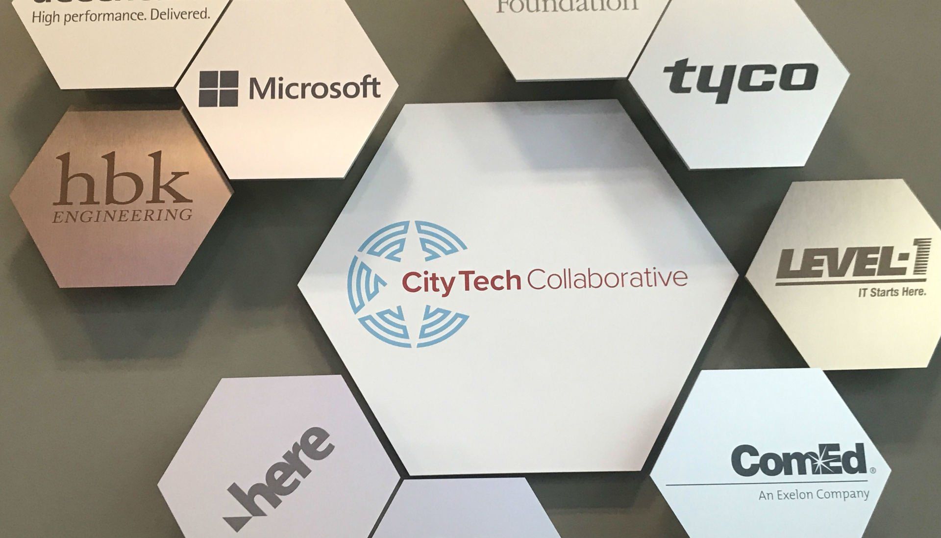Image: City Tech partner logos in UI LABS lobby
