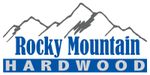 A logo for rocky mountain hardwood with a mountain in the background