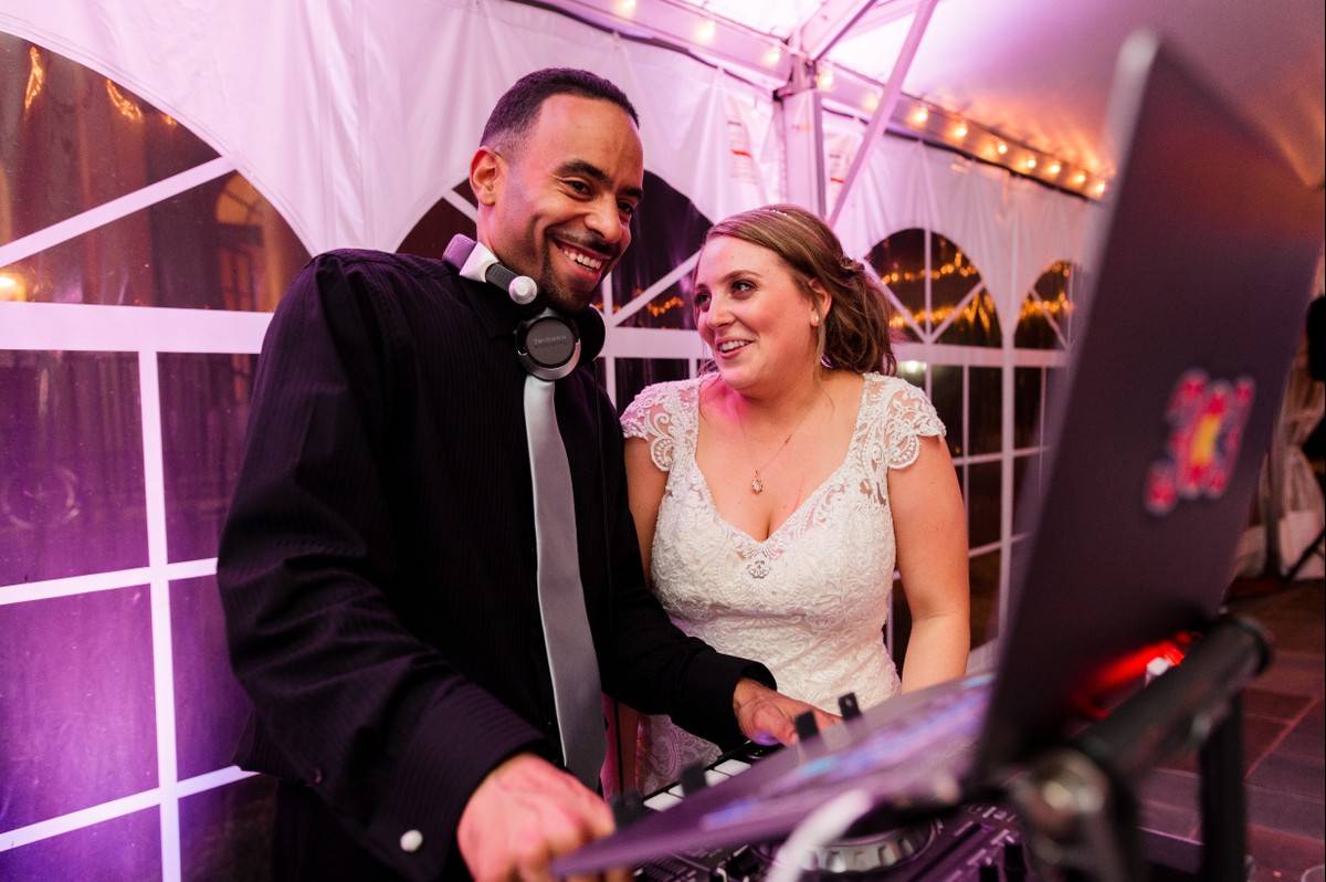 Smiling bride with DJ