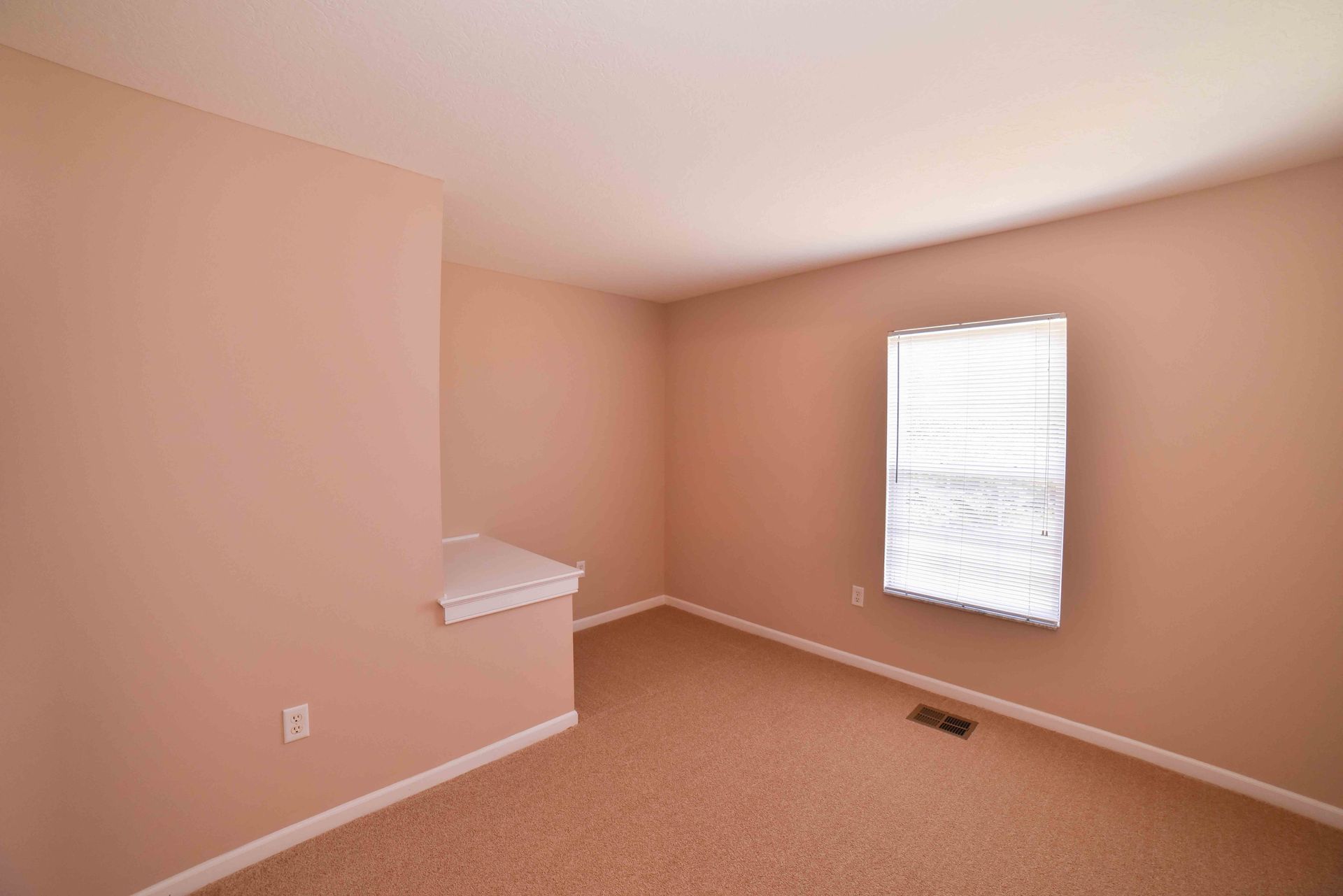 There is a window in the middle of the room.