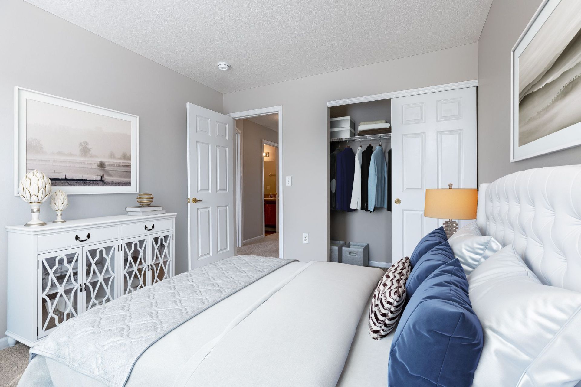 bed with blue pillows