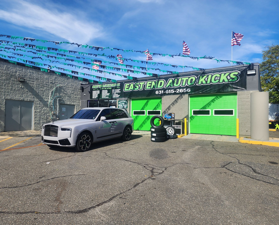 East End Auto Kicks storefront with green doors, signage, and vehicle service offerings | East End Auto Kicks