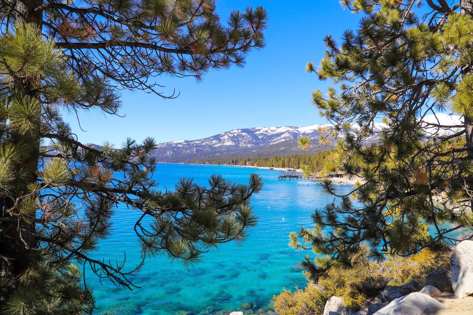 A beautiful lake and mountains in a hazardous terrain, in an area considered high-risk for homeowners insurance. 