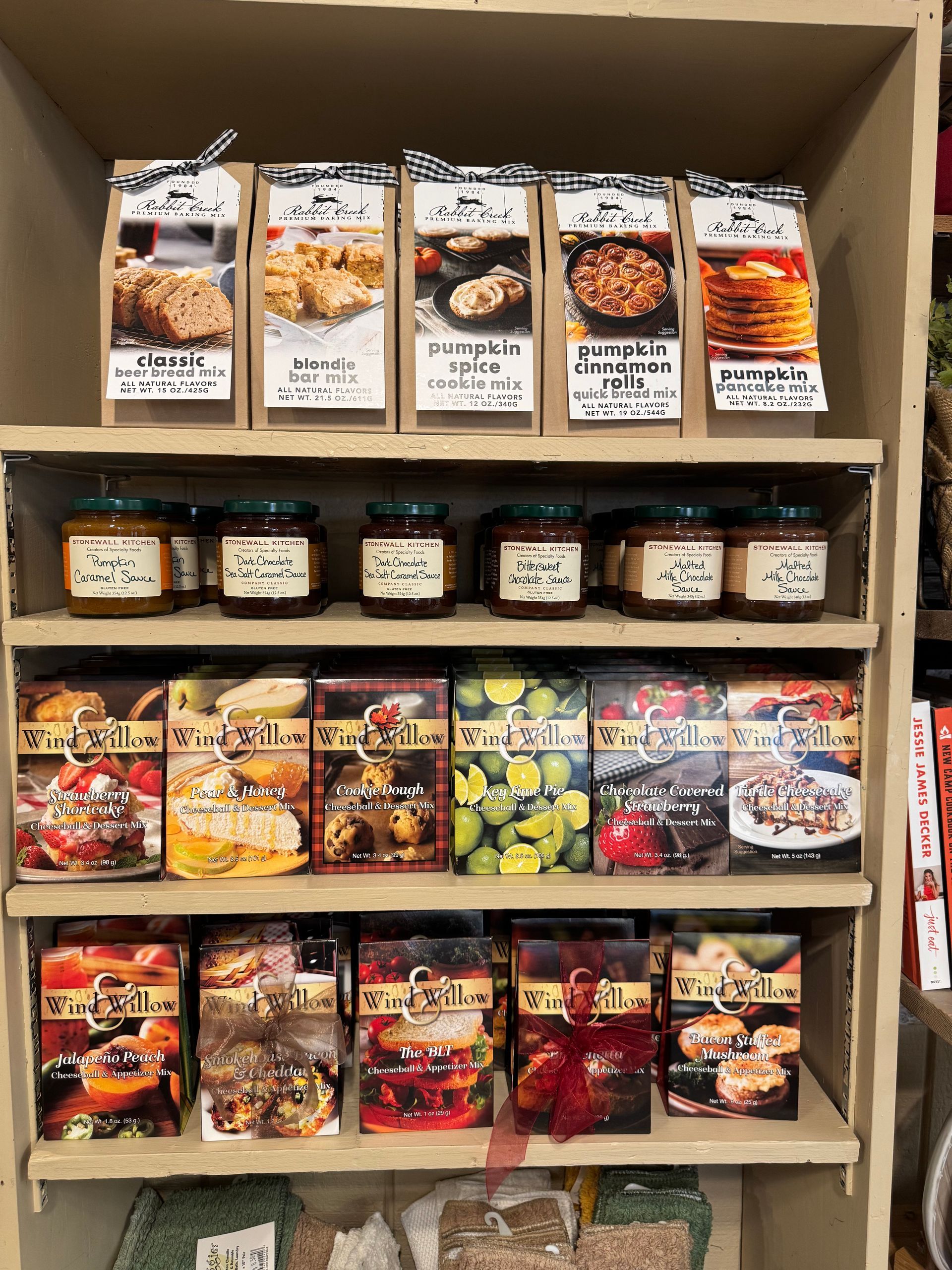 A shelf filled with jars and boxes of food