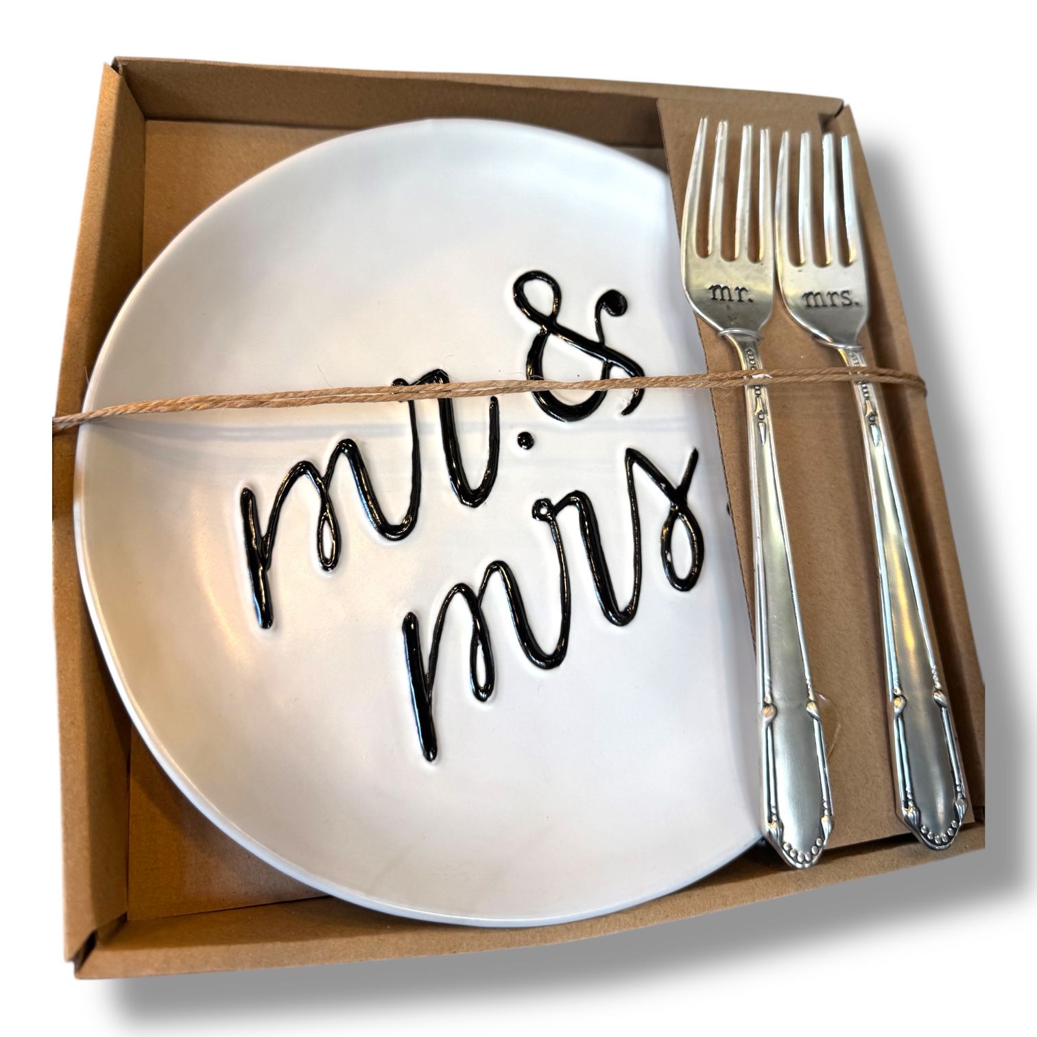 A white plate with mr. and mrs. written on it