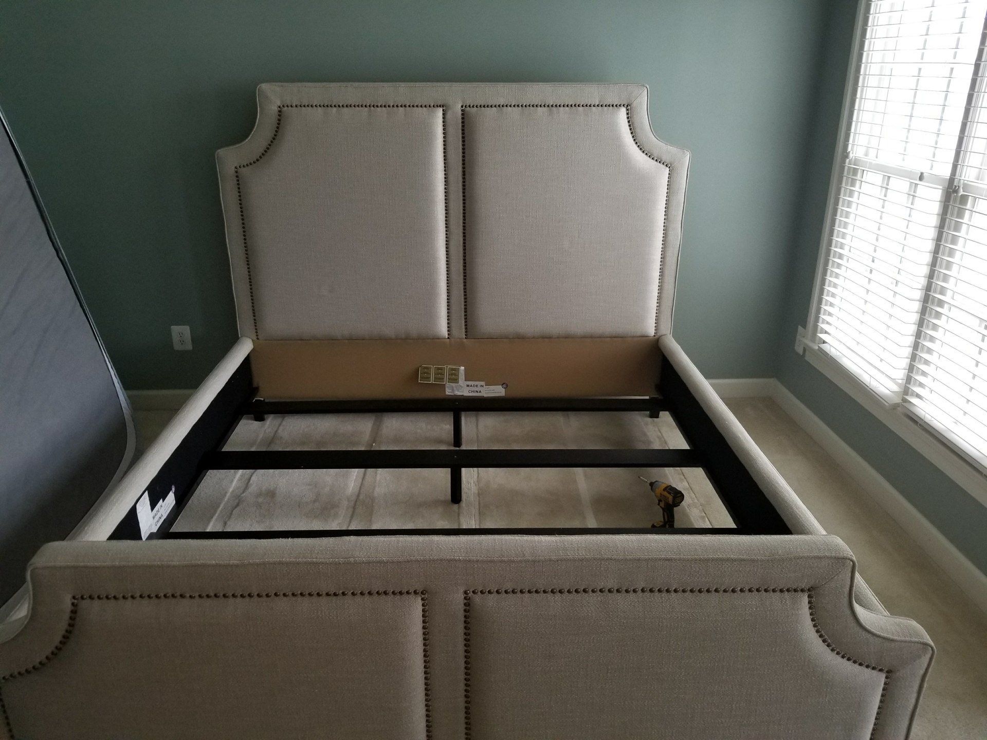 Tufted trim queen bed frame by furniture assembly team
