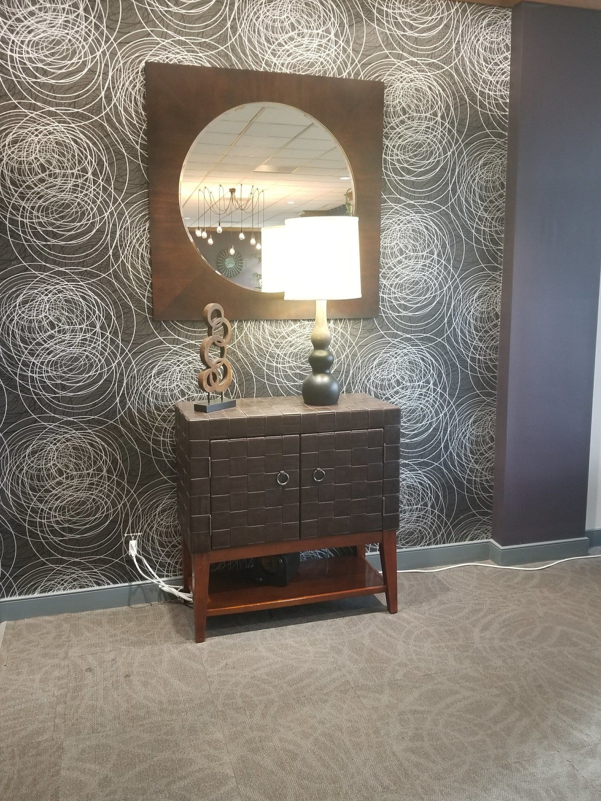 block design bedside table with lamp and inscribed cirlce mirror by dismantle furniture