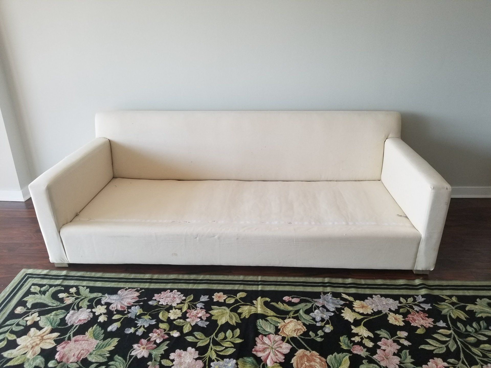 long white couch  by dismantle furniture