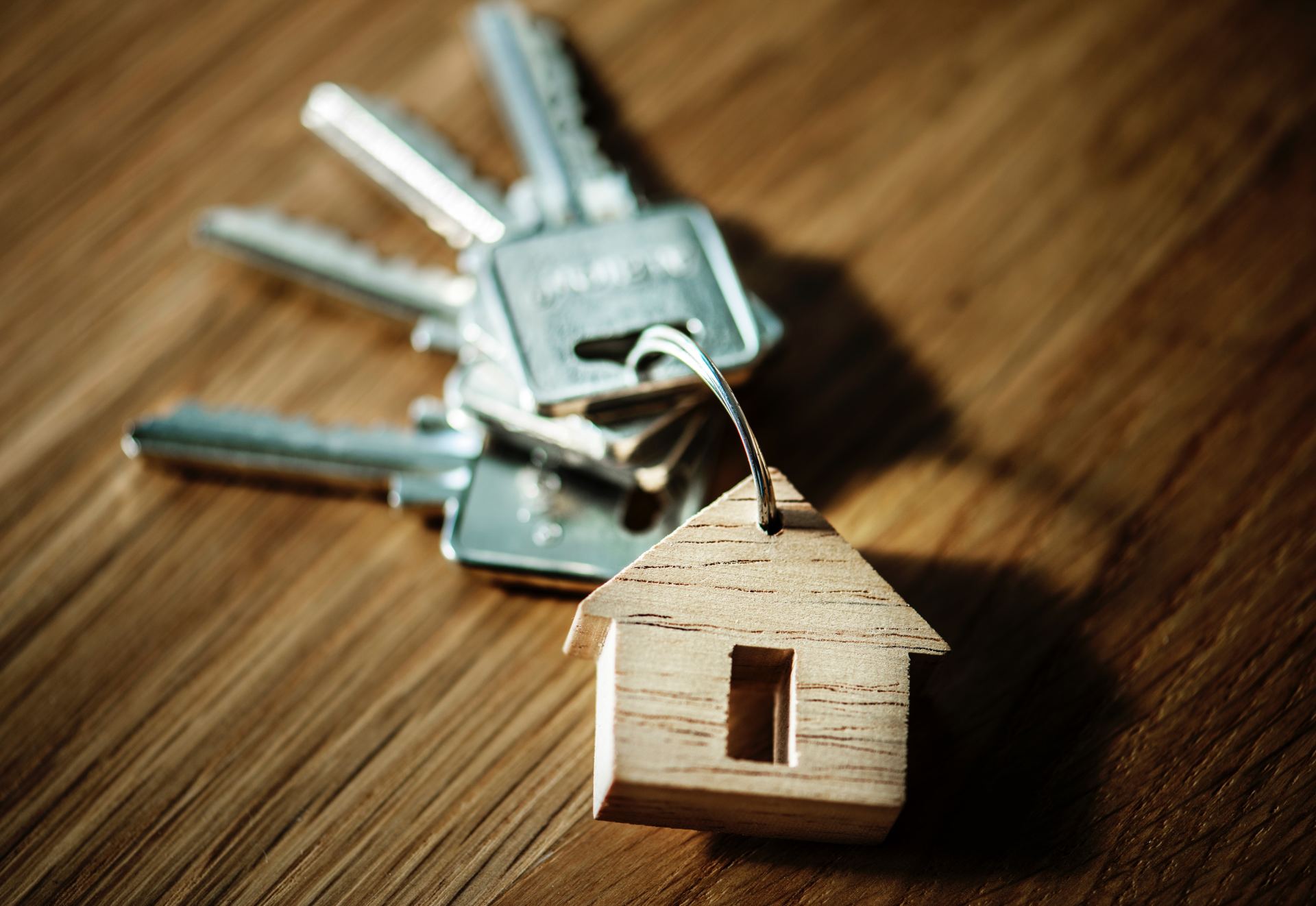 keys with a house-shaped keychain