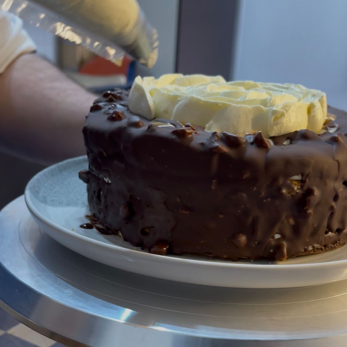 Decorazione della superficie con beccuccio a petalo (o a onde).