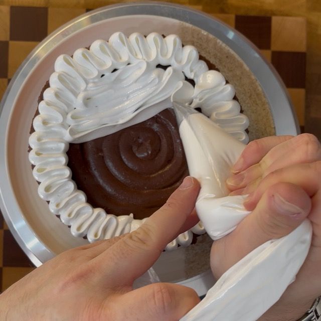 Sac a poche con beccuccio a petalo che decora la superficie