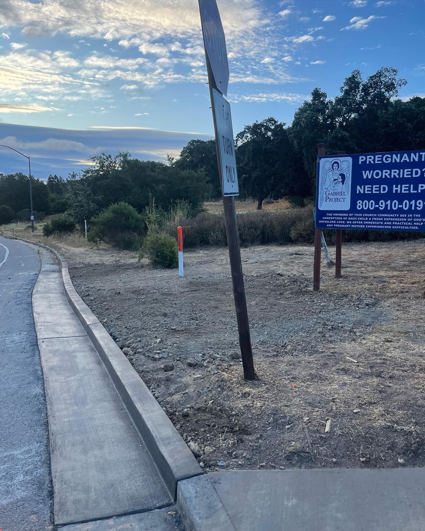 A roadside sign reading 